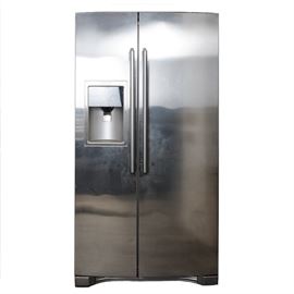 Electrolux Refrigerator: An Electrolux refrigerator. The stainless steel appliance has two doors that fold out to either side. It is equipped with an ice maker and water dispenser. The freezer runs from the top to bottom on the left side. The model number is EW23CS65GS1, and the serial number is 4A80812311. The item was tested and works.
