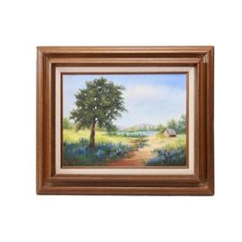 Martha Vermillion Oil on Canvas Landscape Painting: An original oil on board landscape painting by Texas artist Martha Vermillion (1936-2013). The painting depicts a large tree in a field of bluebonnets in blues and oranges with a lake and clear sky in the background of a small cottage surrounded by more foliage. It is signed to the lower left and presented behind a canvas mat in a dark brown finished wood frame with a hanging wire and page of information on Martha Vermillion to the verso.