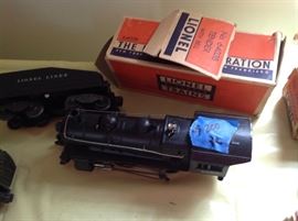 Lionel locomotive with tender with bell.