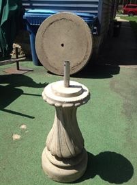 Cement table with pedestal and.cement top. VERY heavy.....needs at least 3 people to move.