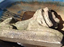 Vintage cement lion.....he is in the wheelbarrow to move him.