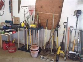 Tool caddy, terracotta pots, hand and garden tools