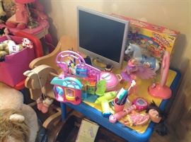 Child's table, and toys, monitor