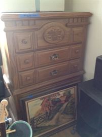 Chest of drawers and pictures