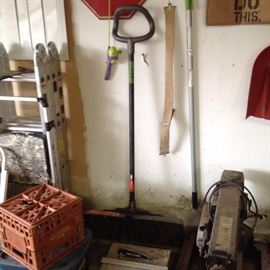 Ladder, milk crates and brooms