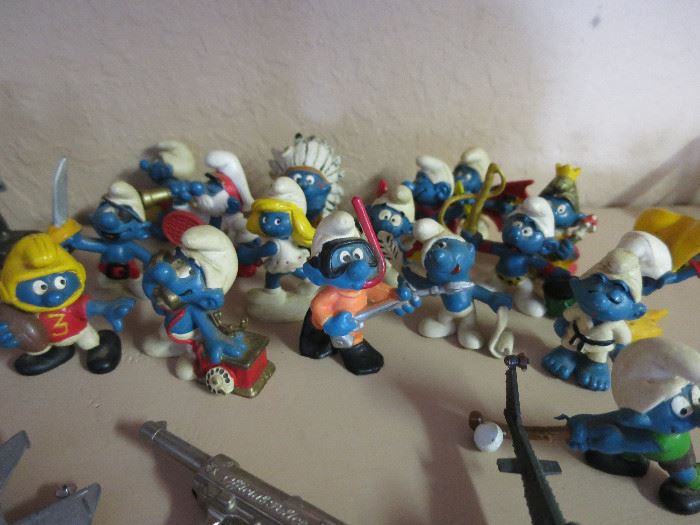 Smurfs. Will be sold as a group.