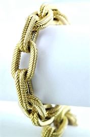 Lot 2: 18kt yellow gold large linked bracelet, engraved design, signed AR, stamped 750, 8"L., 40.1 grams