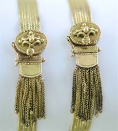 Lot 14: Jewelry: Pair of 14kt yellow gold Victorian mesh bracelets with tassels, 32.6 grams, 7"L.