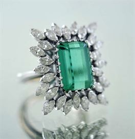 Lot 42: Green tourmaline and diamond ring set in platinum, approx. 8.5 ct Emerald green tourmaline and 28 quality marquise cut diamonds approx. 2.8 ctw
