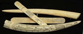 Lot 58: Four piece marine art lot, two pan bone busks "Capt. Reeks" 10"-11" L. with two walrus tusk carvings, 20"L.