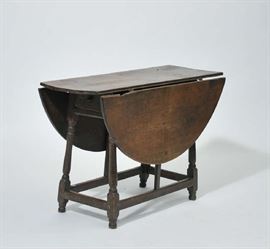 Lot 87: Exceptional 18th C. maple butterfly table with splayed legs and one drawer, old color, 42"L. x 26.5"H. Lillian Blankley Cogan provenance private collection