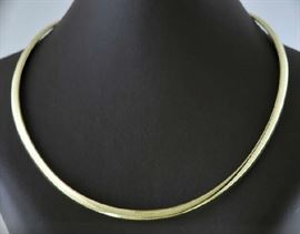 Lot 122: 14k yellow gold omega necklace, 37.2 grams, 16"L.