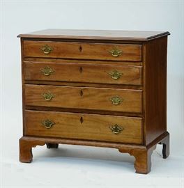 Lot 160: Chippendale graduated four drawer chest on high bracket base, 34"W. x 34"H. x 19"D.