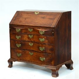Lot 164: Massachusetts 19th C. mahogany two drawer stand with cookie corner top, figural drawers on reeded legs, ca.1825