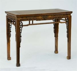 Lot 230: Antique Chinese altar table with one small drawer in a carved apron, 41"L. x 34"H.