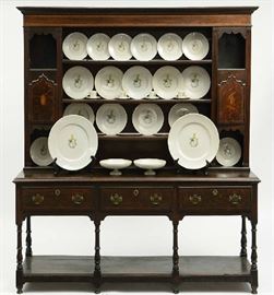Lot 235: Late 18th C./ early 19th C. English inlaid oak welsh dresser, top with doors and open shelves, drawers in base with lower shelf, 70"H. x 73"L.
