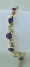 Lot 398: 14k yellow gold amethyst and diamond bracelet, 6.5"L., 17 grams