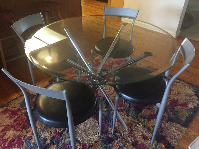 Contemporary chrome and glass table with chairs