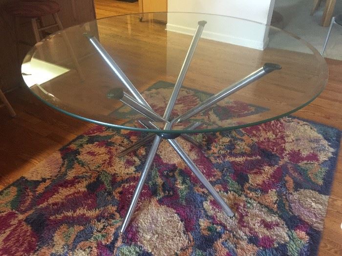 Contemporary chrome and glass table with chairs