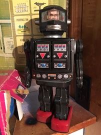 Awesome little Japanese robot toy is looking for some new batteries to show off his stuff!