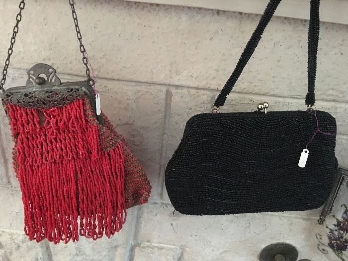 Beaded black and red purses from different eras 