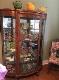Large Curio cabinet with curved glass