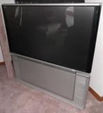 Description:: 57in. Hitachi HDTV projection television attached on a large base with built in speakers. Model 57S715. This item also includes a homemade shelf attached to the top to allow accessories to sit on top but this can easily be removed if needed.
Condition:: Powers on and produces a picture.
Size/weight:: 53.5x54x28 in. HWD
Shipping:: NO SHIPPING!!!