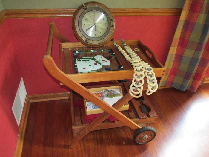 Wooden bar cart and nautical clock