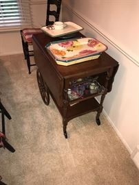 WOODEN TEA CART AND LOTS OF SERVING PLATTERS