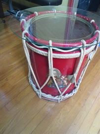 Marching drum , now a table with glass top