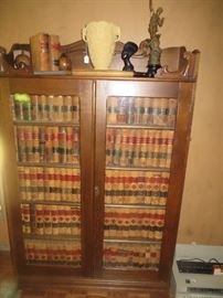 Large ornate two door oak bookcase