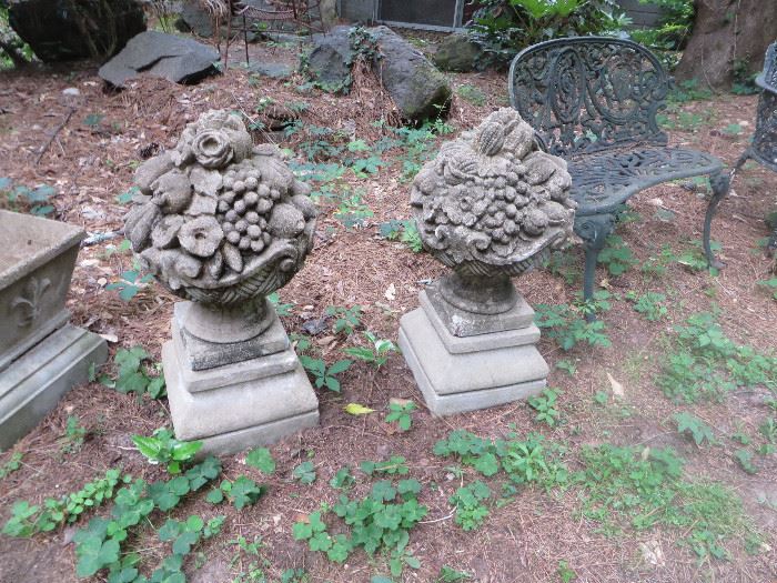 Pair . The base is cement, the baskets of fruit are limestone