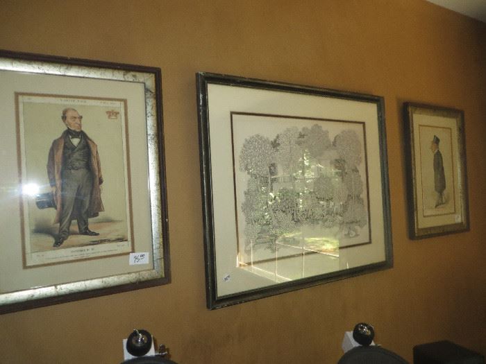 Several of the framed Vanity Fair prints