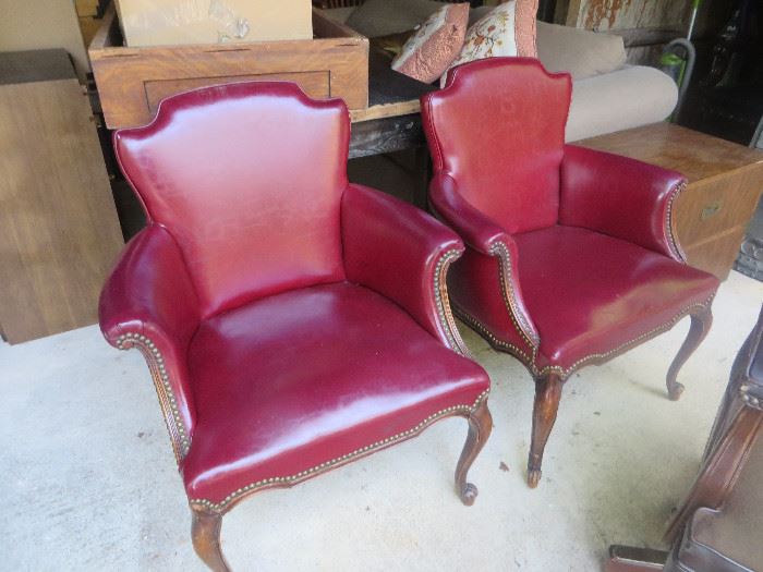 Pair of red leather nail head chairs