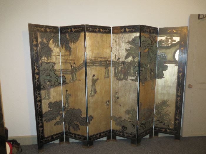 6 panel handpainted and carved screen. Bottom of legs are brass capped. 