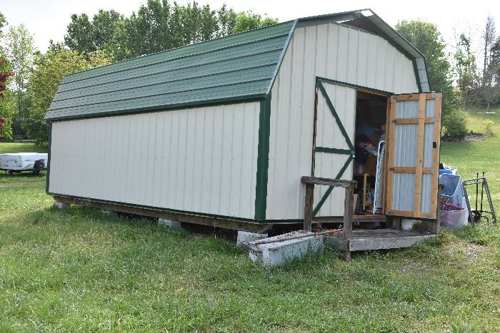 12 X 24 Metal Shed with Skylights and above storage on both sides.