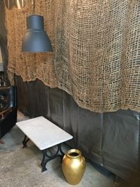 IKEA light fixture, jute netting, and quartz top table