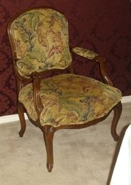 One of two vintage armchairs