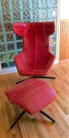 Post Modern Distressed Leather 42.91 in H 29.92 W x 33.86 D Seat H 15.75 one of a kind, place of origin, Italy, Period 2003,2009 Ottoman 13.5 H x 27 W x 24 D Condition: Good , has stripe of surface discoloration on left rear side.