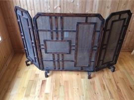 54 L x 34.5 H, iron base with copper patina. Geometric design with hinges that hold together three panels.