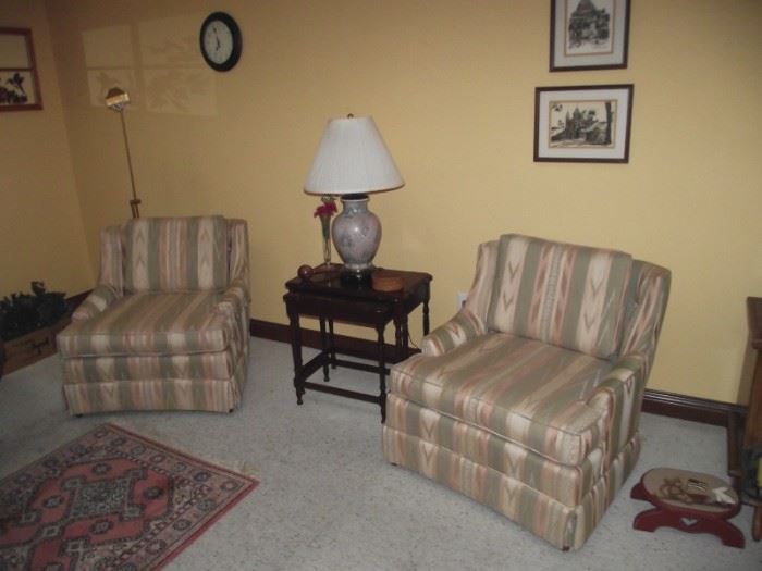 Upholstered club chairs, nesting tables