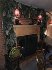 Another view of carved chairs and mantle lamps, Christmas décor.