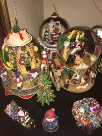 Radko and other designer collectible Christmas snow globes and figurines 