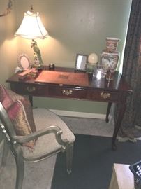 Mahogany desk, porcelain parrot lamp, wonderful chair!