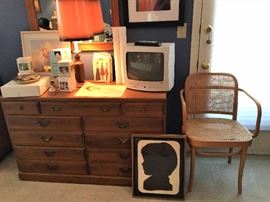 Early american style dresser, mirror, Polish bentwood chair with cane seat and back, small TV/VCR combo, vintage sewing patterns