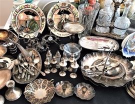 Lotsa silver plate, some souvenir spoons, lotus bowls and candle holders