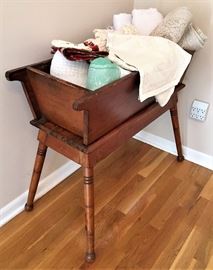Antique dough table.  Lace and linen vintage tablecloths.