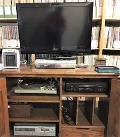 Technic's turntable and tape deck, VCR, Samsung flat screen TV.  Back issues of almost every cooking magazine - complete back to the 1970's.  Gourmet, Bon Apetite, Food & Wine, Cooks, Fine Cooking, Saveur, tons more