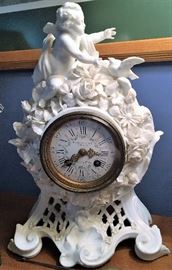 Howell James & Co.  French porcelain mantle clock - circa 1900. 