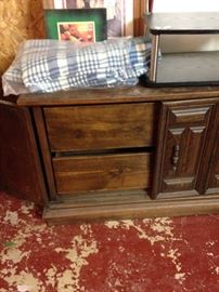 #125 cabinet w drawers behind $75